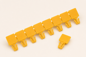 Detachable yellow seals used with the transparent zipper-lock mechanism of the Security Zipper Bag with ID Window.