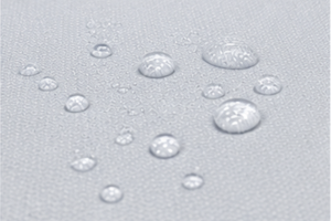 Close-up of water droplets beading on the exterior of the Fireproof & Waterproof Security Bag.
